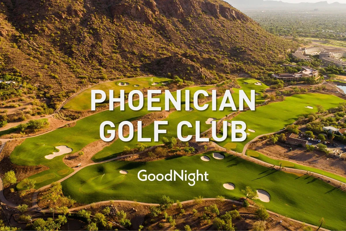 An expansive view of a manicured golf course with rolling green fairways, set against a stunning mountain backdrop. The scene captures people golfing and socializing outdoors, while the sun casts a warm glow over the landscape, creating a tranquil yet invigorating environment.